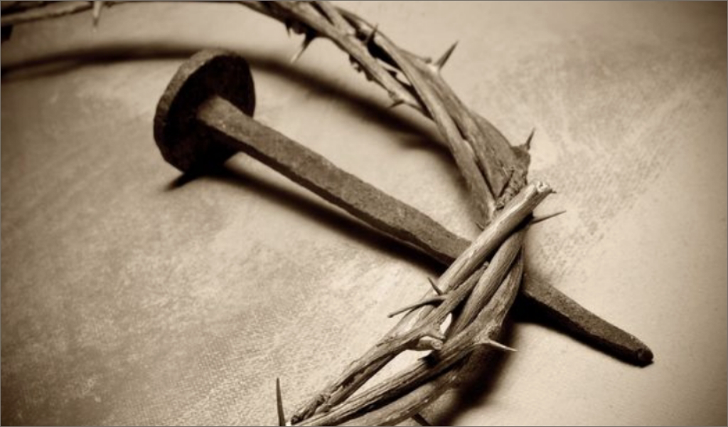 A crown of thorns with nails on it, symbolizing the suffering endured by Jesus Christ for humanity.